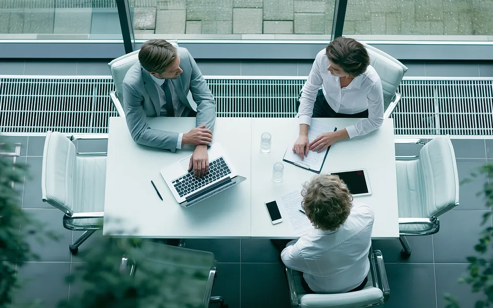 Business negotiations in an office Business negotiations in an office